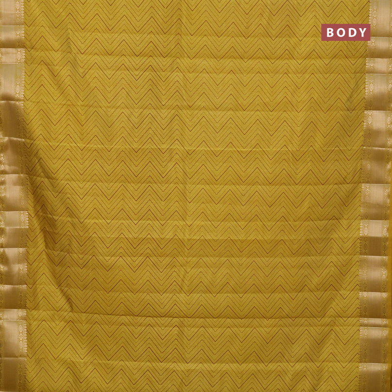 Semi raw silk saree yellow with allover zig zag prints and zari woven border