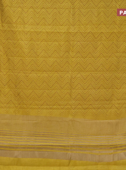 Semi raw silk saree yellow with allover zig zag prints and zari woven border