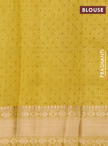 Semi raw silk saree yellow with allover zig zag prints and zari woven border