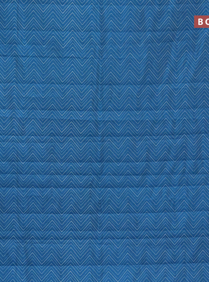 Semi raw silk saree cs blue with allover zig zag prints and zari woven border