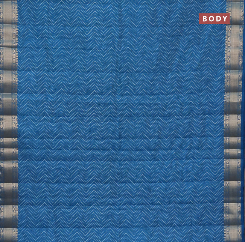 Semi raw silk saree cs blue with allover zig zag prints and zari woven border