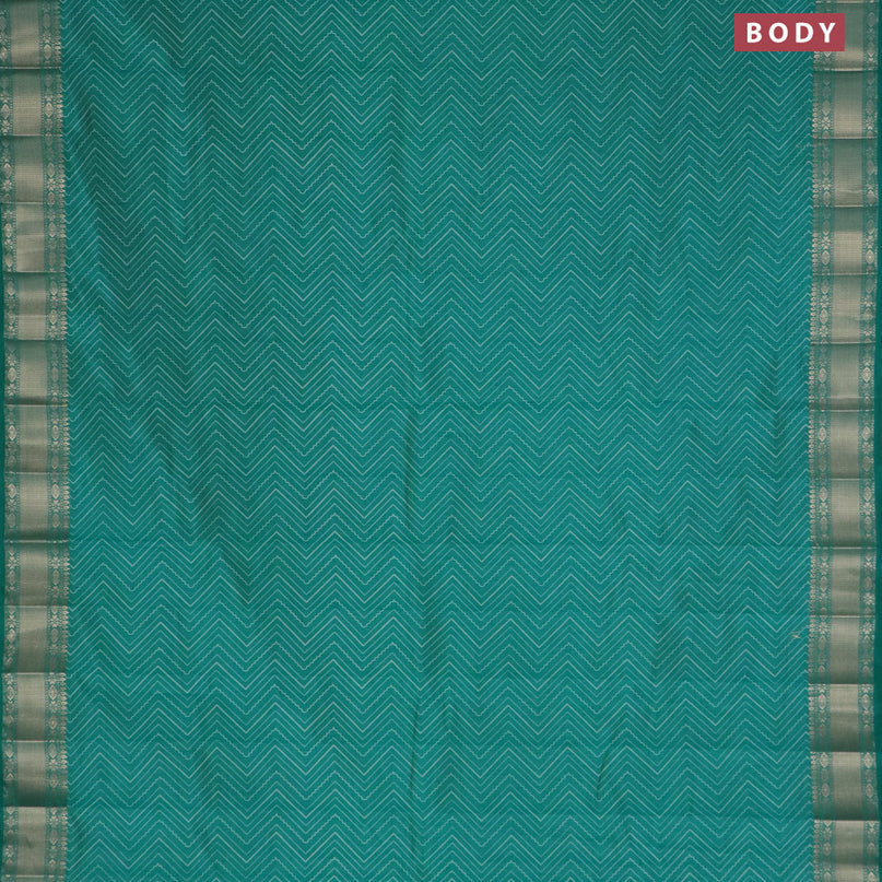 Semi raw silk saree teal blue with allover zig zag prints and zari woven border