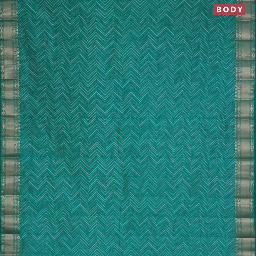 Semi raw silk saree teal blue with allover zig zag prints and zari woven border