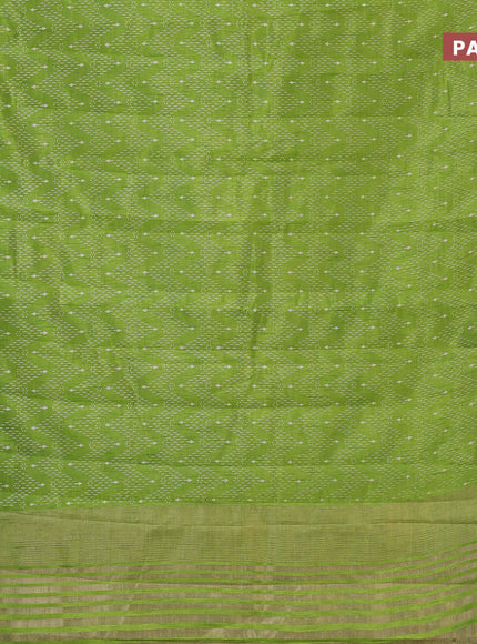 Semi raw silk saree light green with allover prints and zari woven border