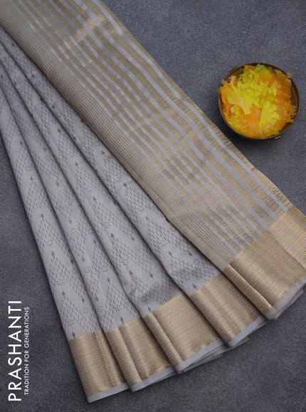 Semi raw silk saree grey with allover prints and zari woven border