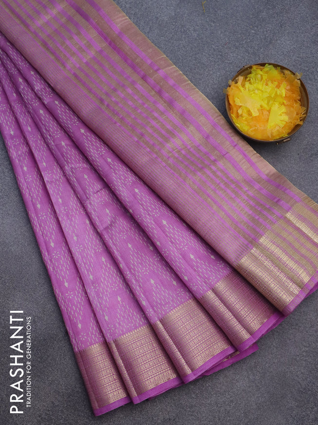 Semi raw silk saree lavender with allover prints and zari woven border