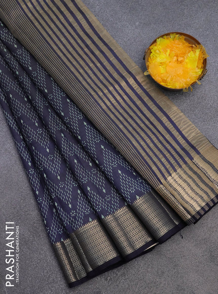 Semi raw silk saree navy blue with allover prints and zari woven border