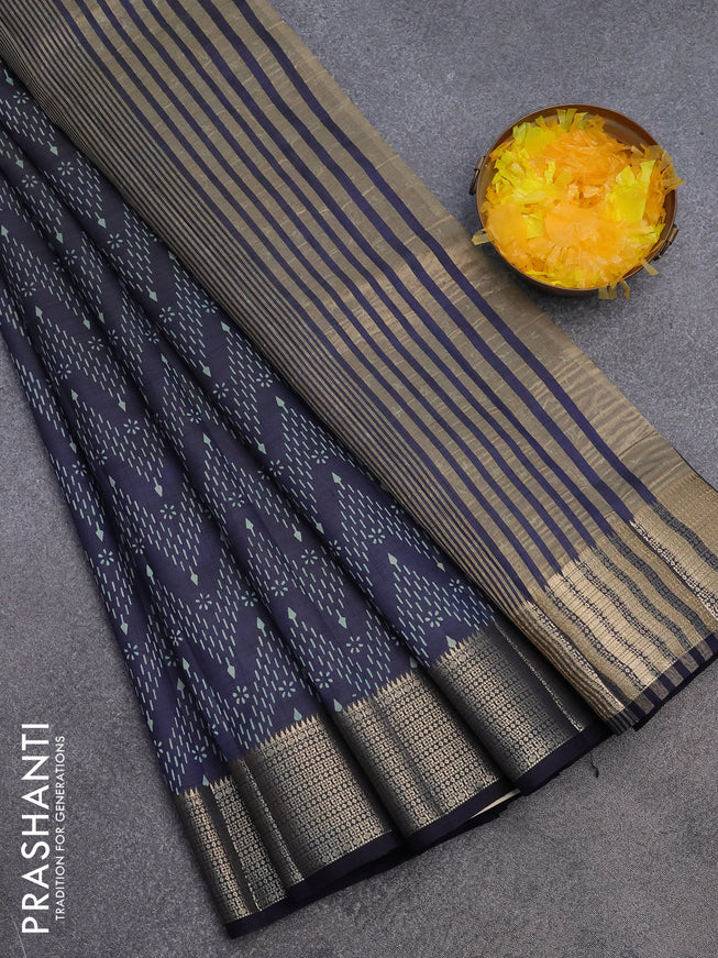 Semi raw silk saree navy blue with allover prints and zari woven border