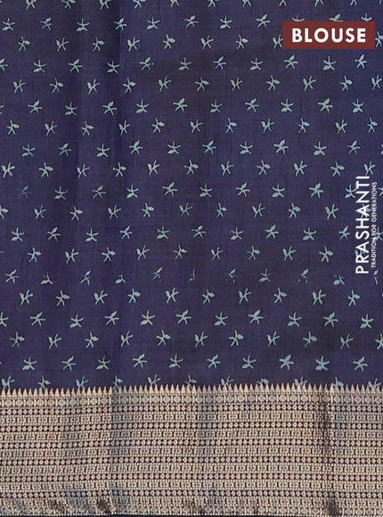 Semi raw silk saree navy blue with allover prints and zari woven border