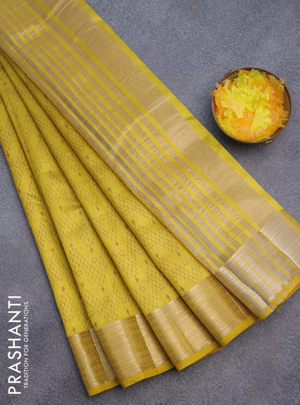 Semi raw silk saree yellow with allover prints and zari woven border