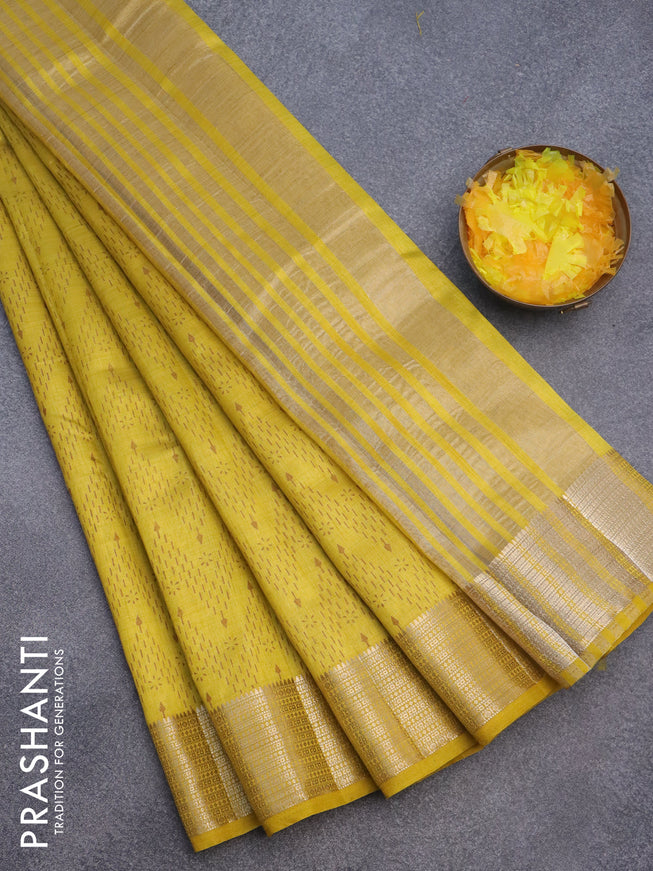 Semi raw silk saree yellow with allover prints and zari woven border