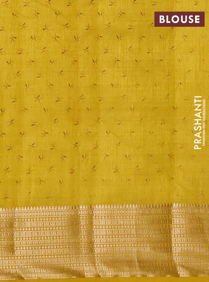 Semi raw silk saree yellow with allover prints and zari woven border