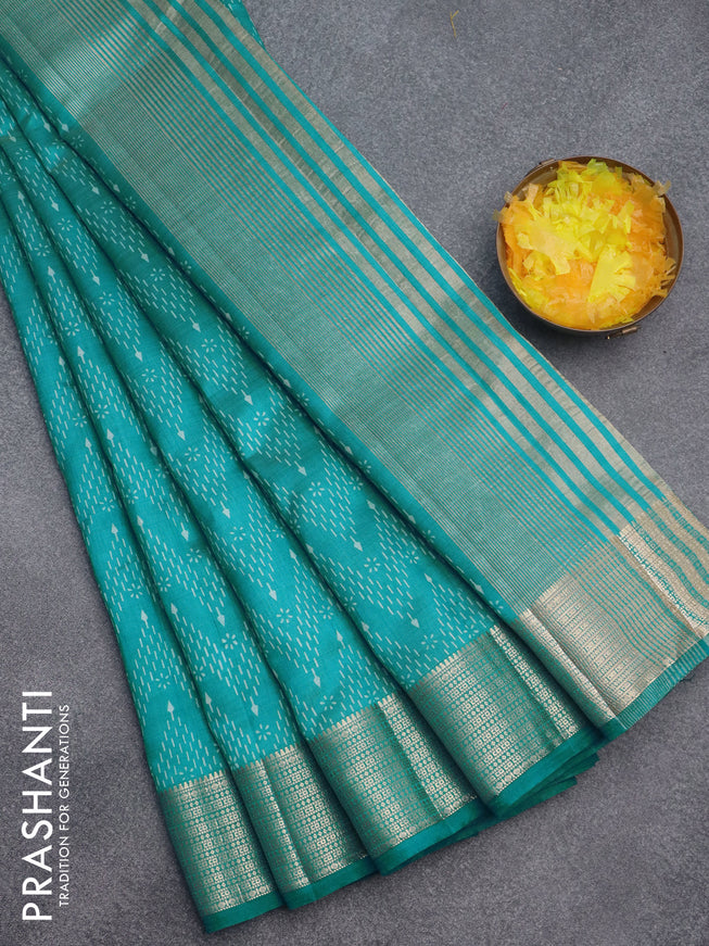 Semi raw silk saree teal blue with allover prints and zari woven border