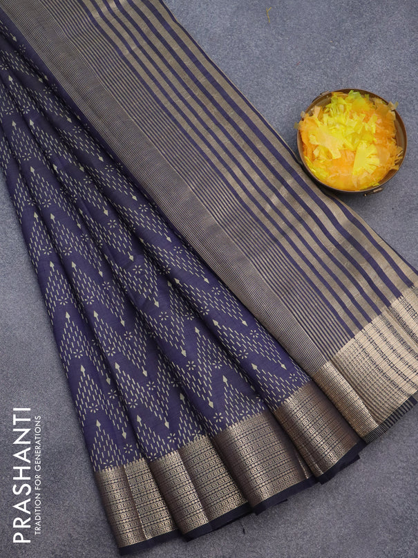 Semi raw silk saree navy blue with allover prints and zari woven border