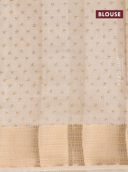 Semi raw silk saree cream with allover prints and zari woven border