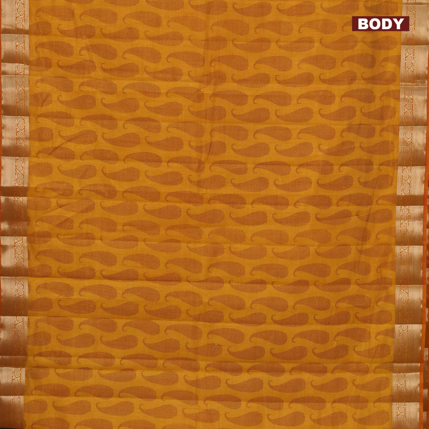 Semi raw silk saree dark mustard with paisley butta prints and zari woven border