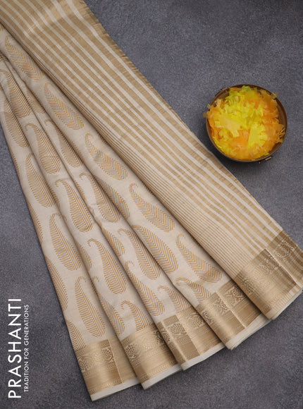 Semi raw silk saree cream with paisley butta prints and zari woven border