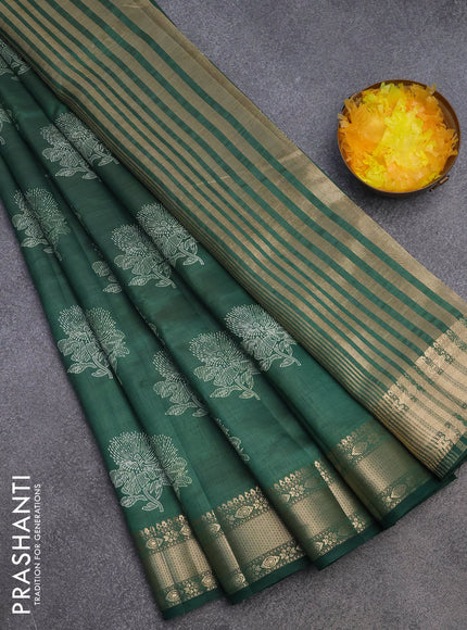 Semi raw silk saree green with floral butta prints and zari woven border