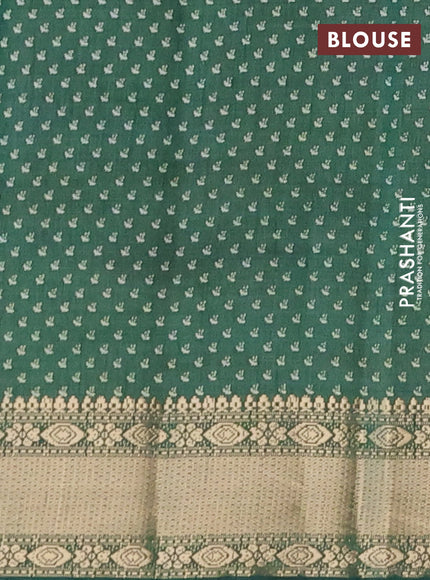 Semi raw silk saree green with floral butta prints and zari woven border