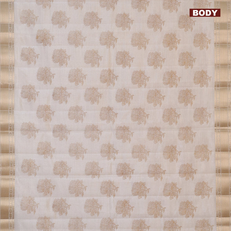 Semi raw silk saree cream with floral butta prints and zari woven border