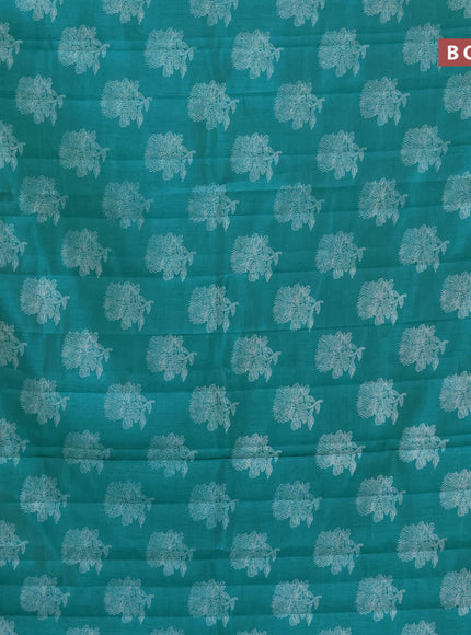 Semi raw silk saree teal blue with floral butta prints and zari woven border