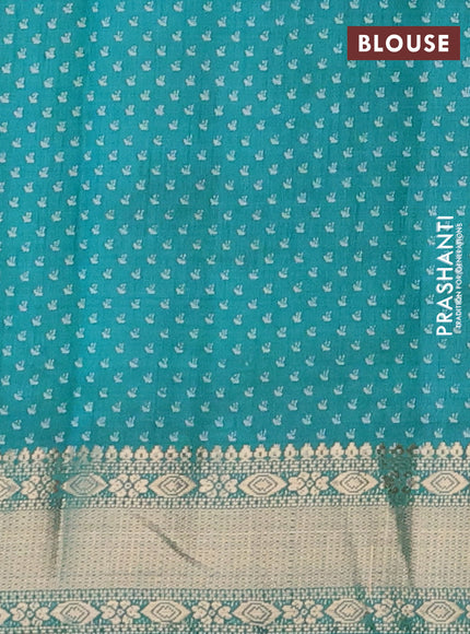 Semi raw silk saree teal blue with floral butta prints and zari woven border