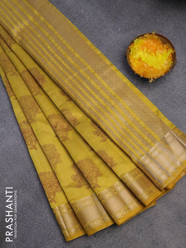 Semi raw silk saree yellow with floral butta prints and zari woven border