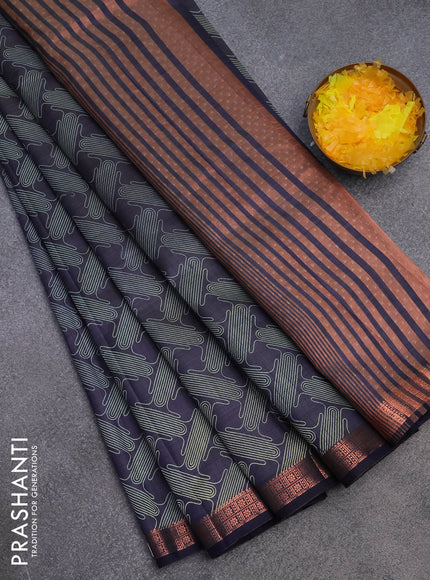 Semi raw silk saree navy blue with allover prints and copper zari woven border