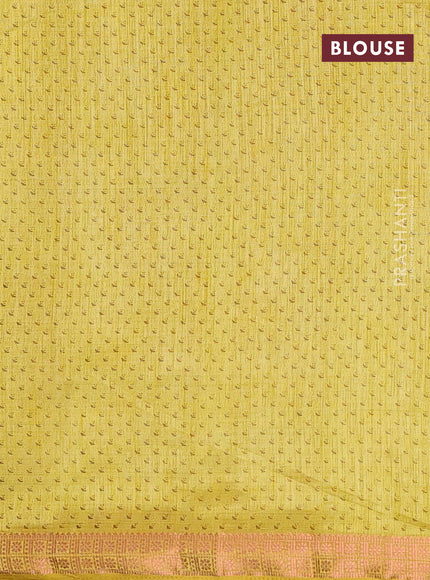 Semi raw silk saree yellow with allover prints and copper zari woven border