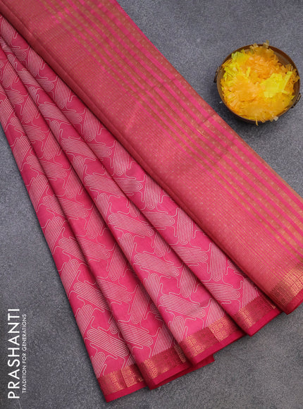 Semi raw silk saree pink with allover prints and copper zari woven border