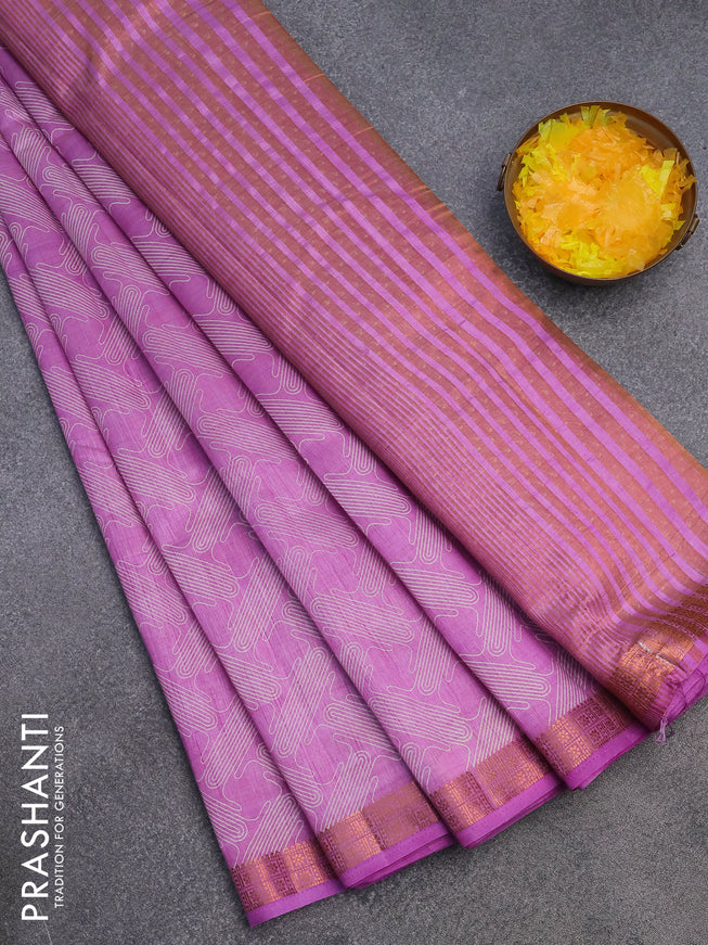 Semi raw silk saree lavebder with allover prints and copper zari woven border