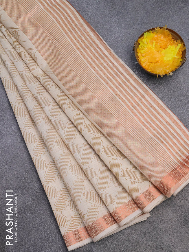 Semi raw silk saree cream with allover prints and copper zari woven border