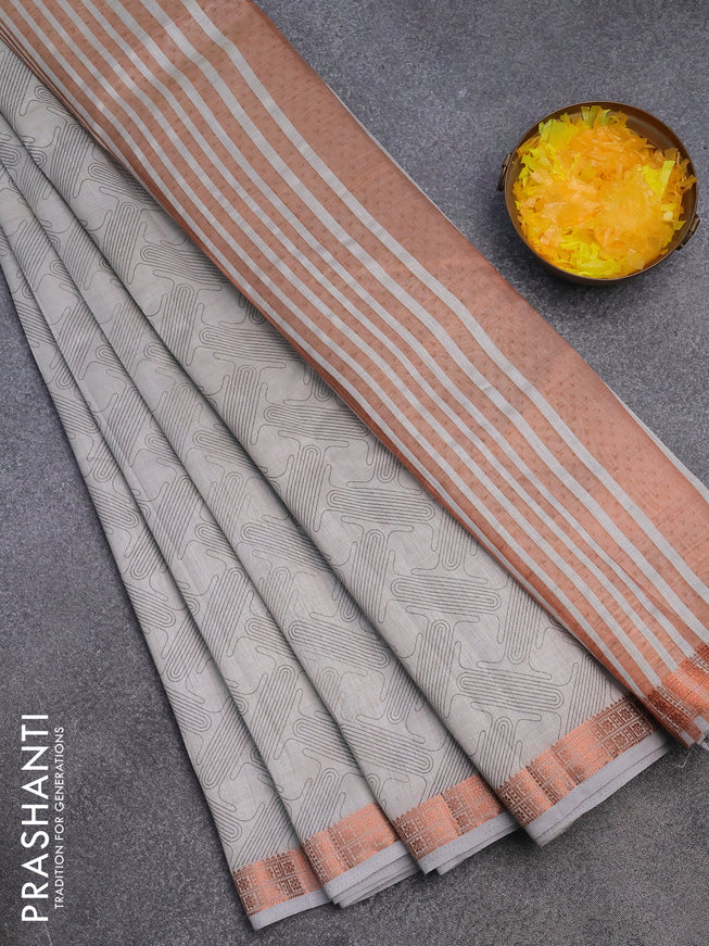 Semi raw silk saree pastel grey with allover prints and copper zari woven border