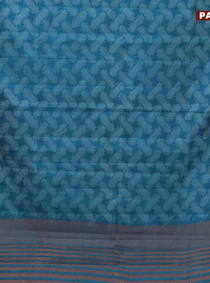 Semi raw silk saree blue with allover prints and copper zari woven border