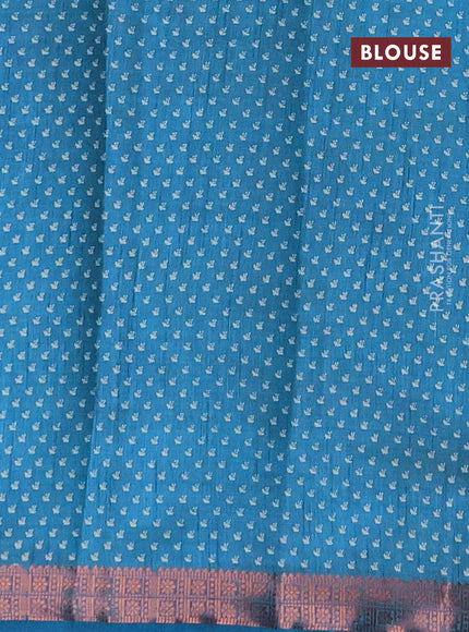 Semi raw silk saree blue with allover prints and copper zari woven border