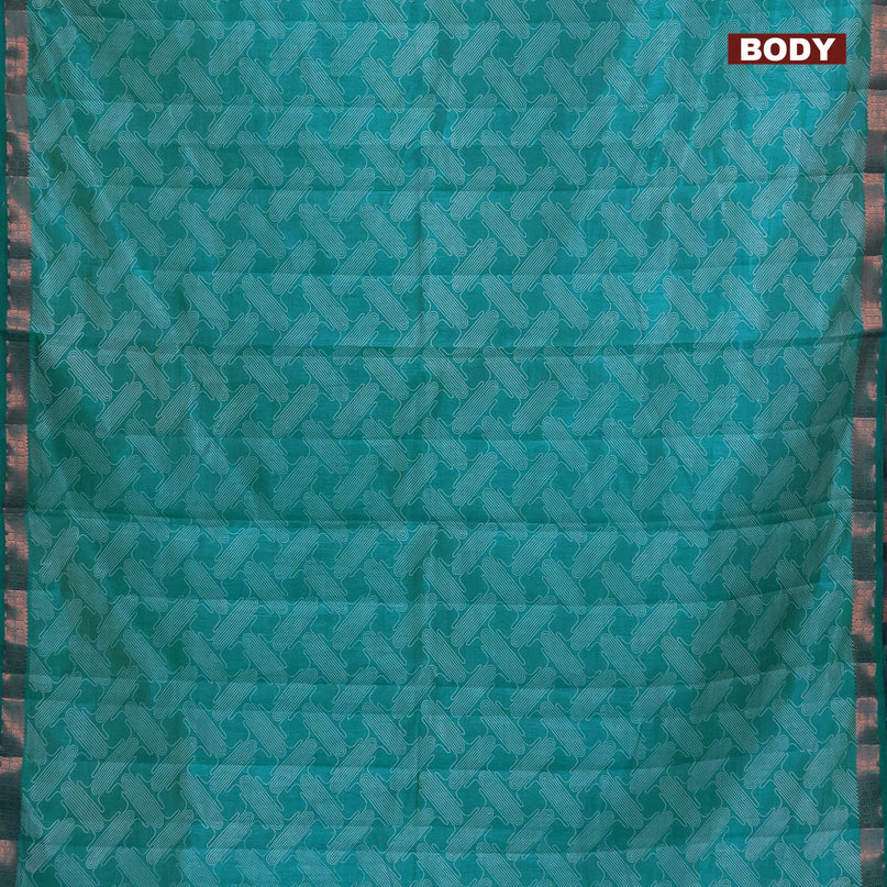 Semi raw silk saree teal blue shade with allover prints and copper zari woven border