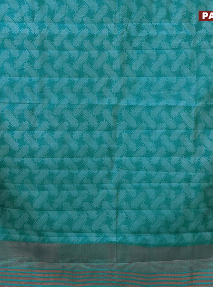 Semi raw silk saree teal blue shade with allover prints and copper zari woven border