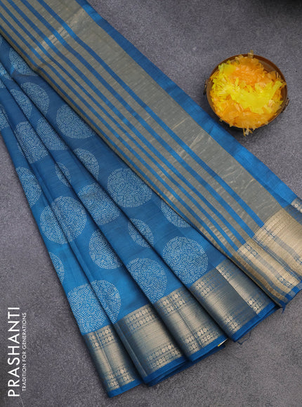 Semi raw silk saree blue with butta prints and zari woven border