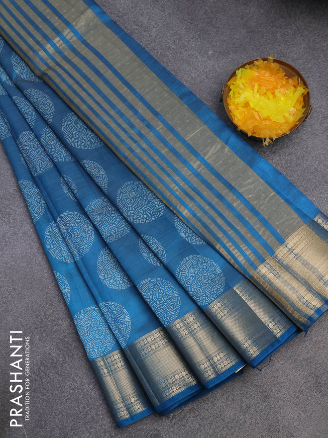 Semi raw silk saree blue with butta prints and zari woven border