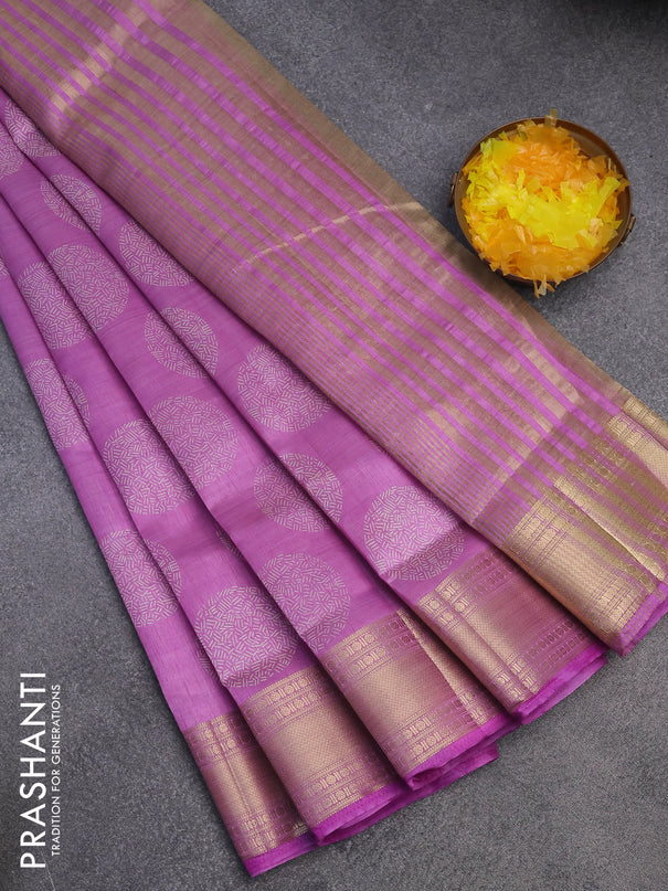 Semi raw silk saree lavender shade with butta prints and zari woven border