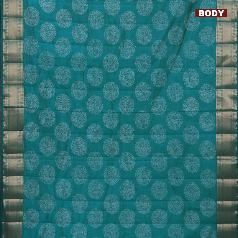 Semi raw silk saree teal blue shade with butta prints and zari woven border