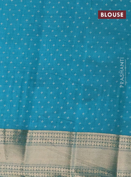 Semi raw silk saree teal blue shade with butta prints and zari woven border