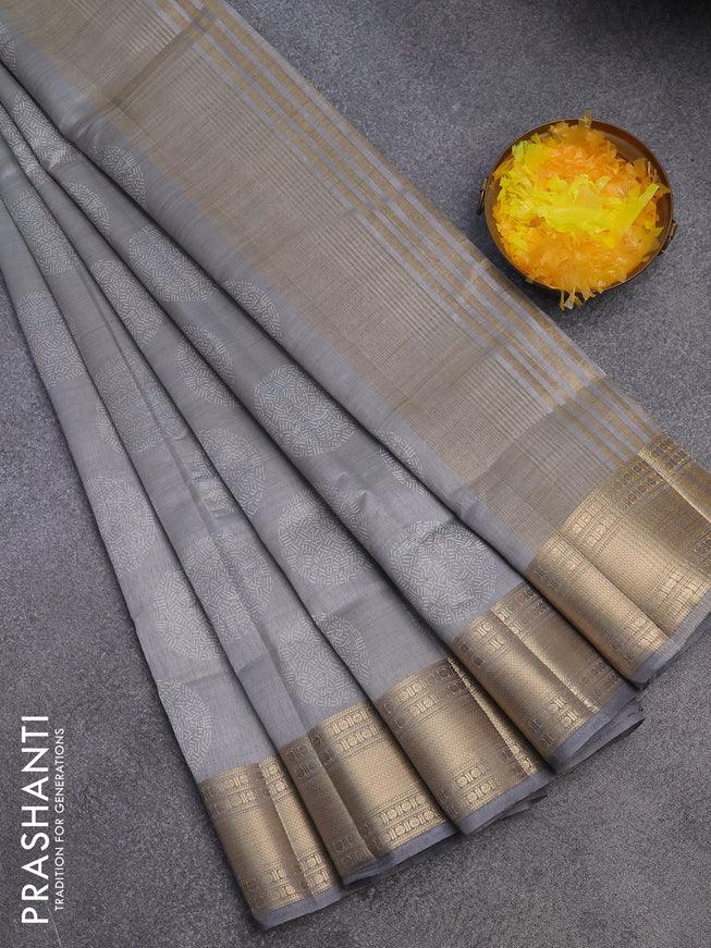 Semi raw silk saree grey with butta prints and zari woven border