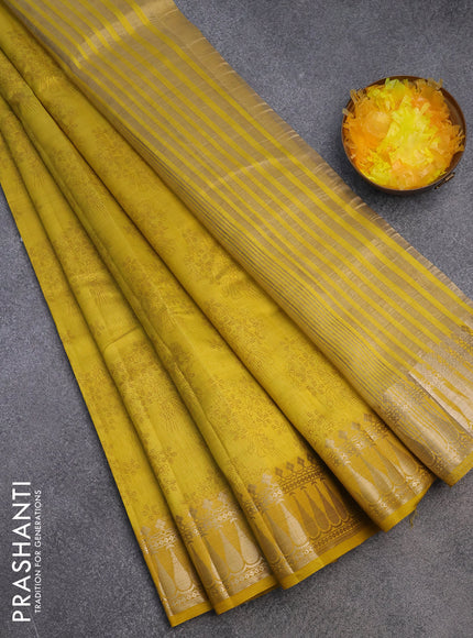 Semi raw silk saree mustard yellow with floral butta prints and zari woven border