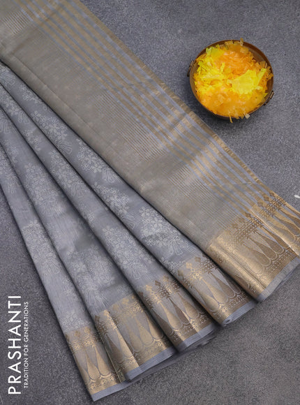 Semi raw silk saree grey with floral butta prints and zari woven border