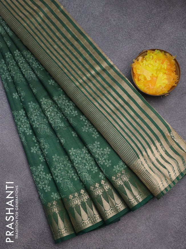 Semi raw silk saree bottle green with floral butta prints and zari woven border