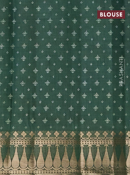 Semi raw silk saree bottle green with floral butta prints and zari woven border