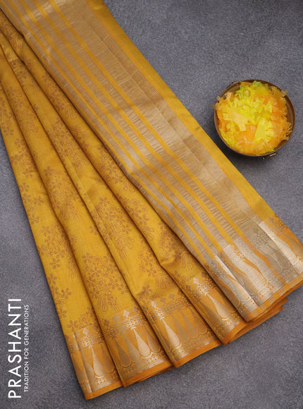 Semi raw silk saree dark mustard with floral butta prints and zari woven border