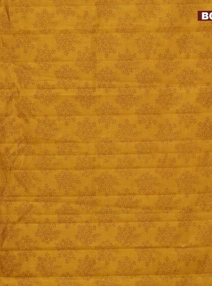 Semi raw silk saree dark mustard with floral butta prints and zari woven border