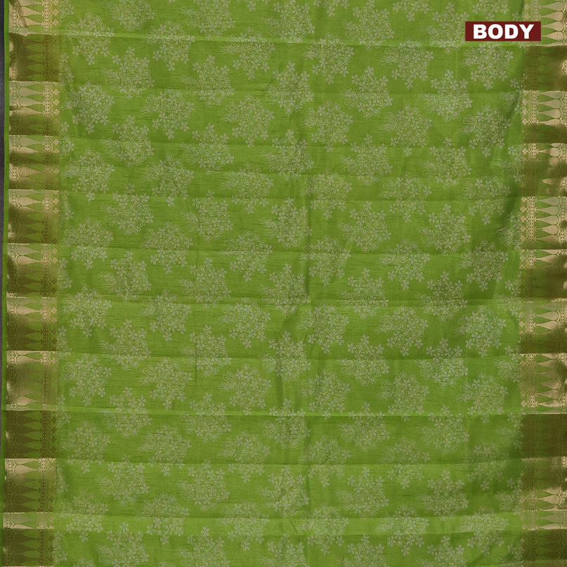 Semi raw silk saree light green with floral butta prints and zari woven border